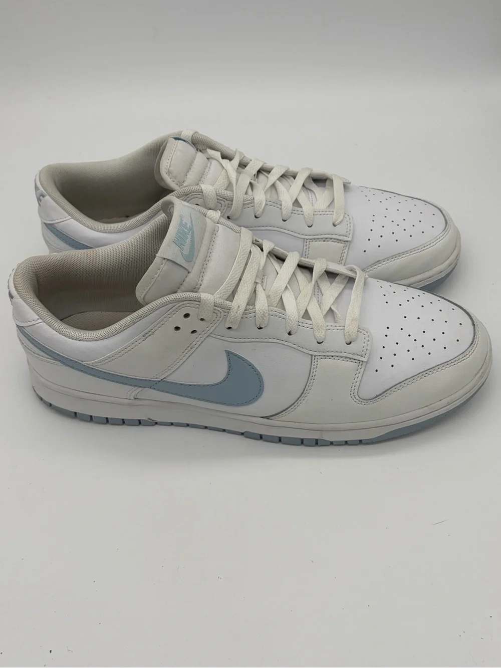 Nike Dunks Men’s Low-Top Sneakers in White with Light Blue Swoosh